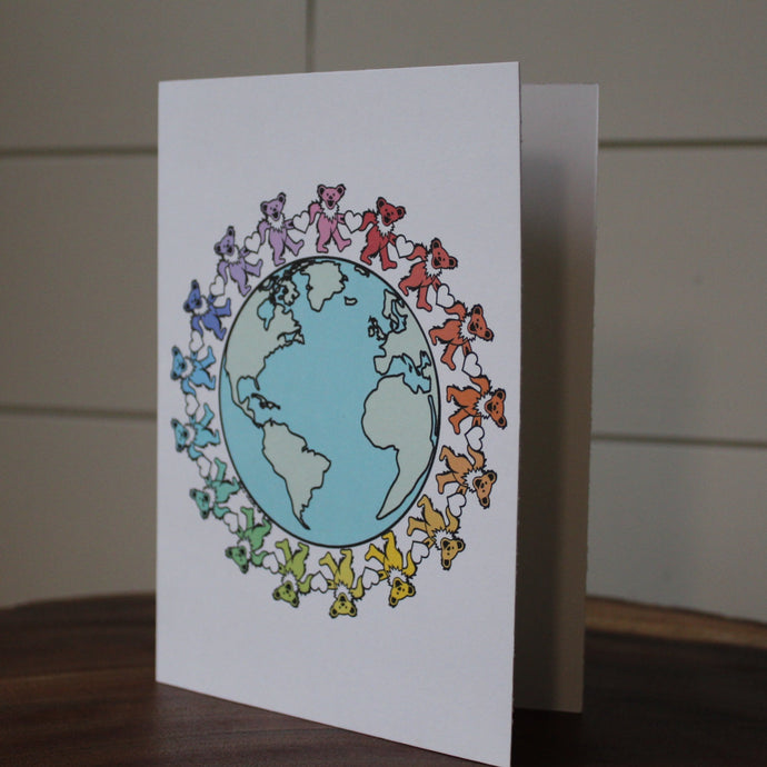Grateful Dead Greeting Card featuring a rainbow assortment of marching bears dancing around a graphic of earth #gratefuldeadgreetingcard #gratefuldeadparty